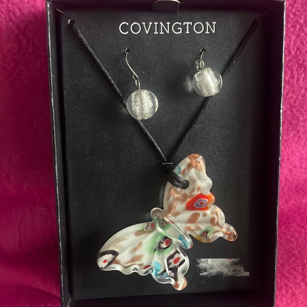 Nice butterfly necklace and matching drop earrings.